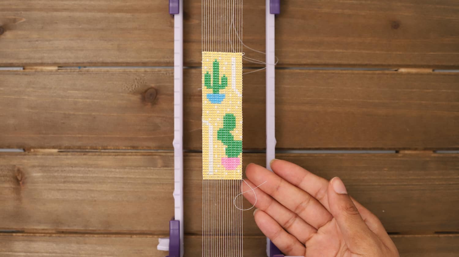 Beading on a loom